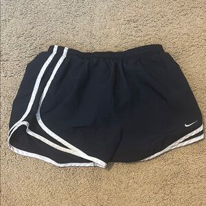 Nike Black and White Athletic Shorts with Dolphin Hem